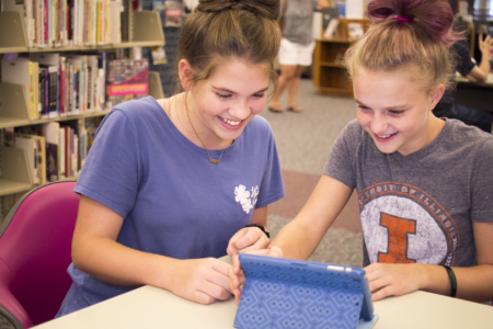 Patrons enjoying the variety of digital content available through the library